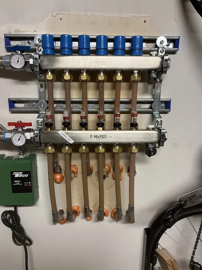 Plumber performing Water Heater Repair at a residential property in Rayville